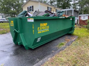 Dumpster rental cape cod full on clients driveway